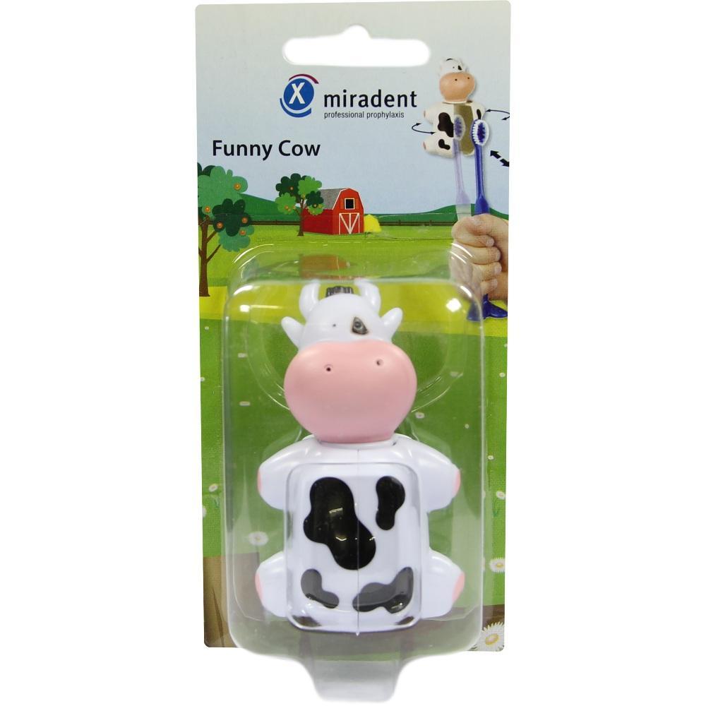 Eine Zahnbürste mit einer lustigen, kleinen Kuh als Griff.