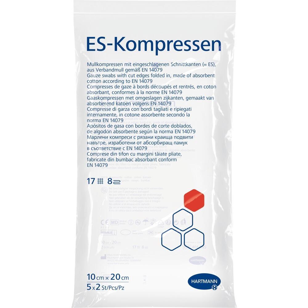 Eine weiße Verpackung mit der Aufschrift "ES-Kompressen" und mehrsprachiger Produktbeschreibung.