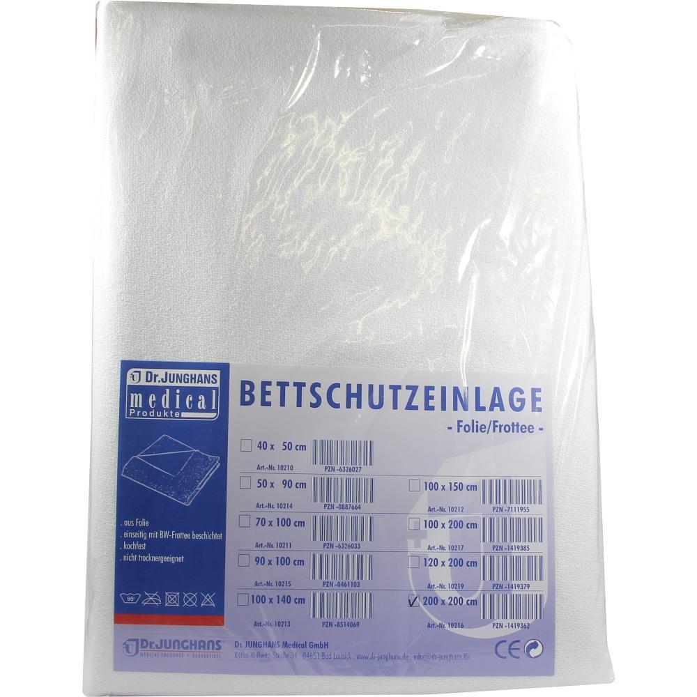 Verpackung einer Bettschutzauflage von Dr. Junghans, wei&szlig; und aus Folie/Frottee.