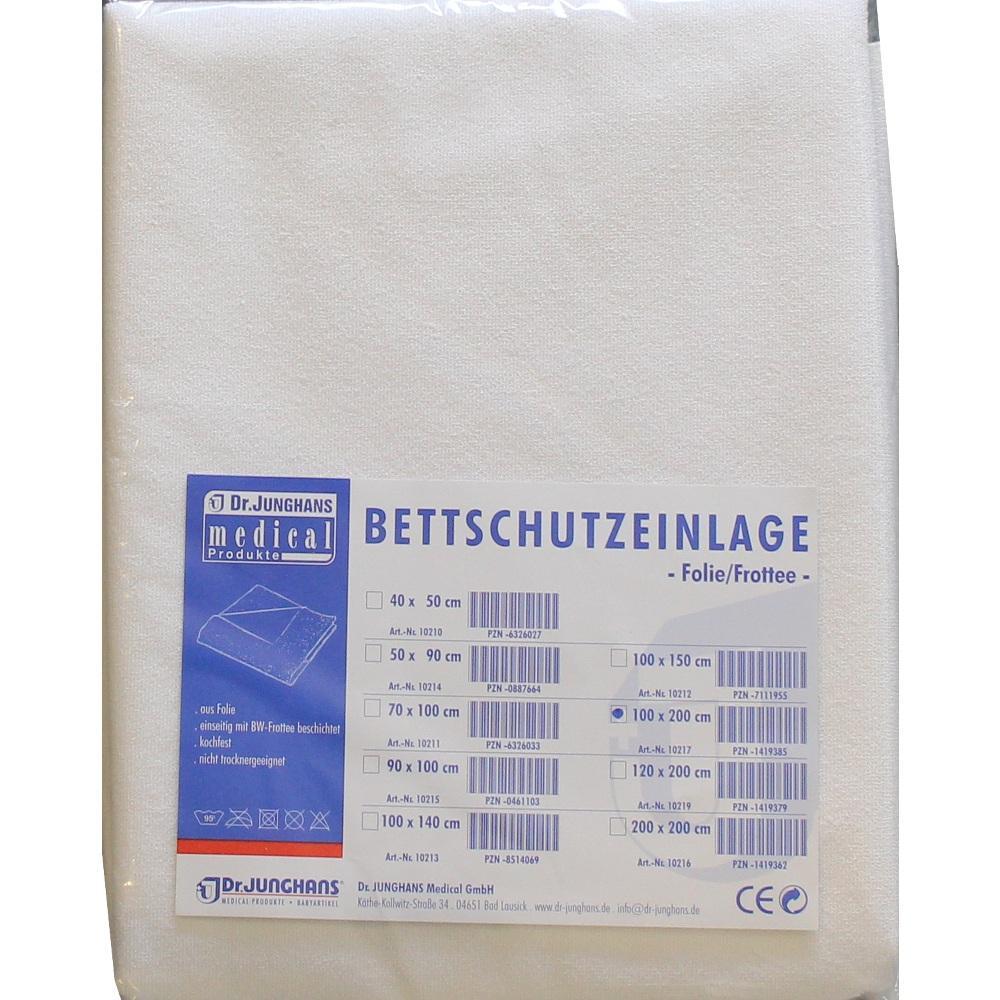 Verpackte Bettschutzauflage mit Label im Vordergrund.
