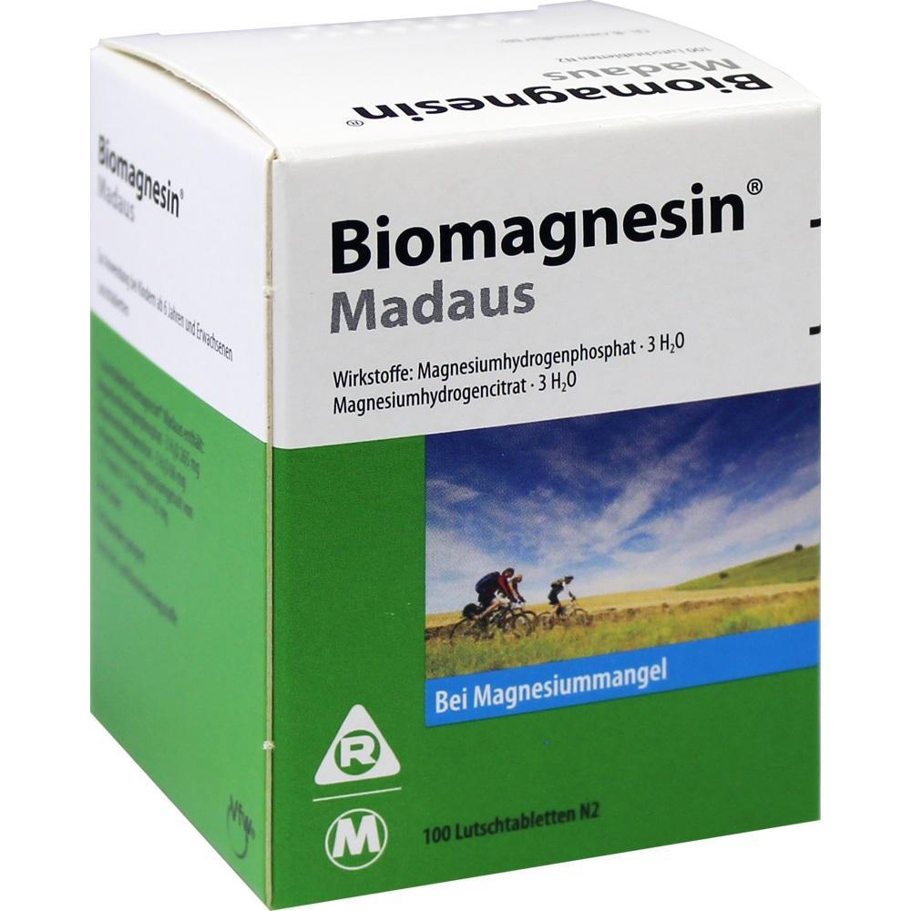 Grüne Packung Biomagnesin Madaus gegen Magnesiummangel mit Bild von Radfahrern.