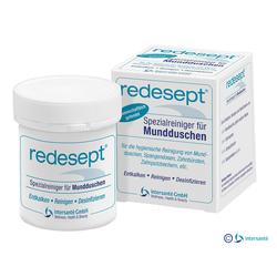 Dose und Schachtel eines Spezialreinigers f&uuml;r Mundduschen stehen nebeneinander.