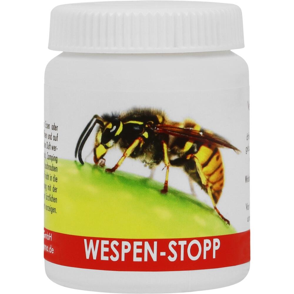 Ein wei&szlig;er Beh&auml;lter mit einem Bild einer Wespe und rotem Schriftzug "WESPEN-STOPP".