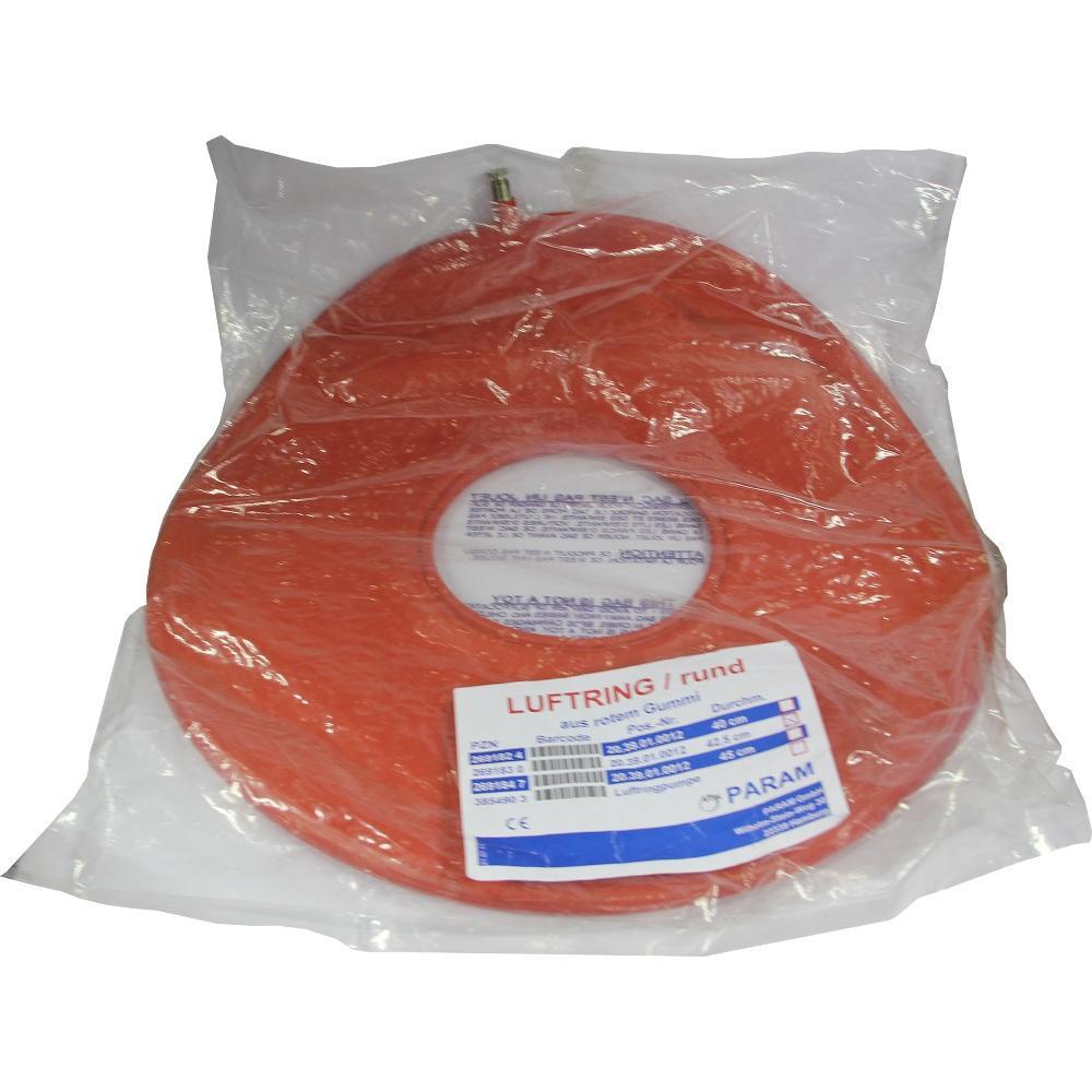 Ein runder roter Luftkissenring in einer transparenten Plastikverpackung.