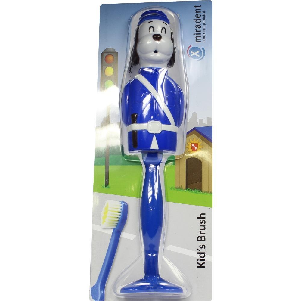 Blaue Zahnbürste in Form eines Hundesoldaten in einer Verpackung.