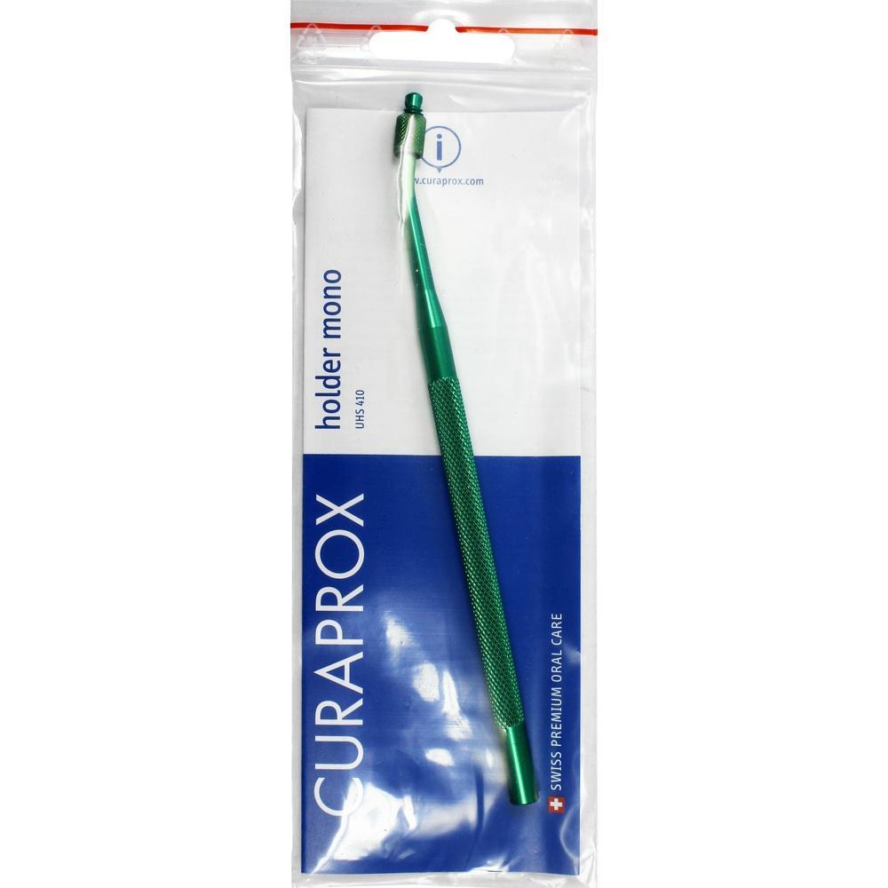 Gr&uuml;ner Zahnb&uuml;rstenhalter in einer Verpackung aus Plastik.