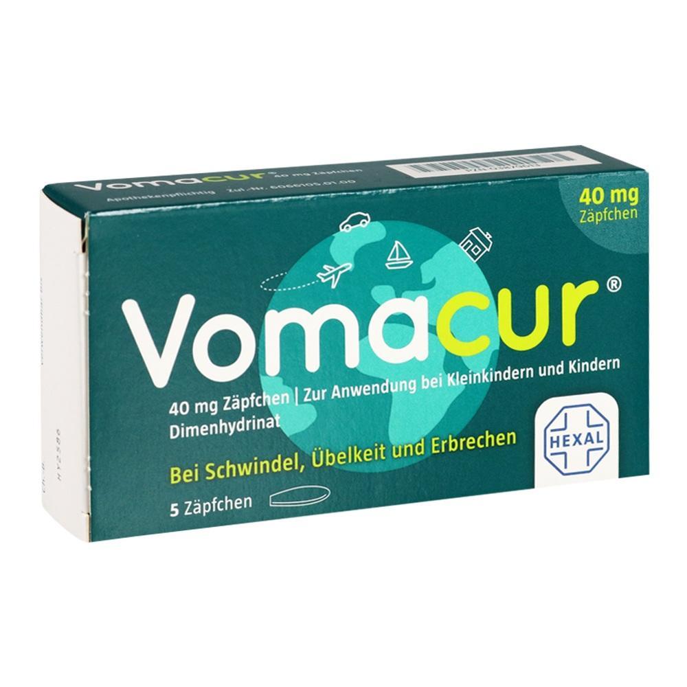 Grüne Verpackung mit der Aufschrift "Vomacur", einem Medikament gegen Übelkeit.