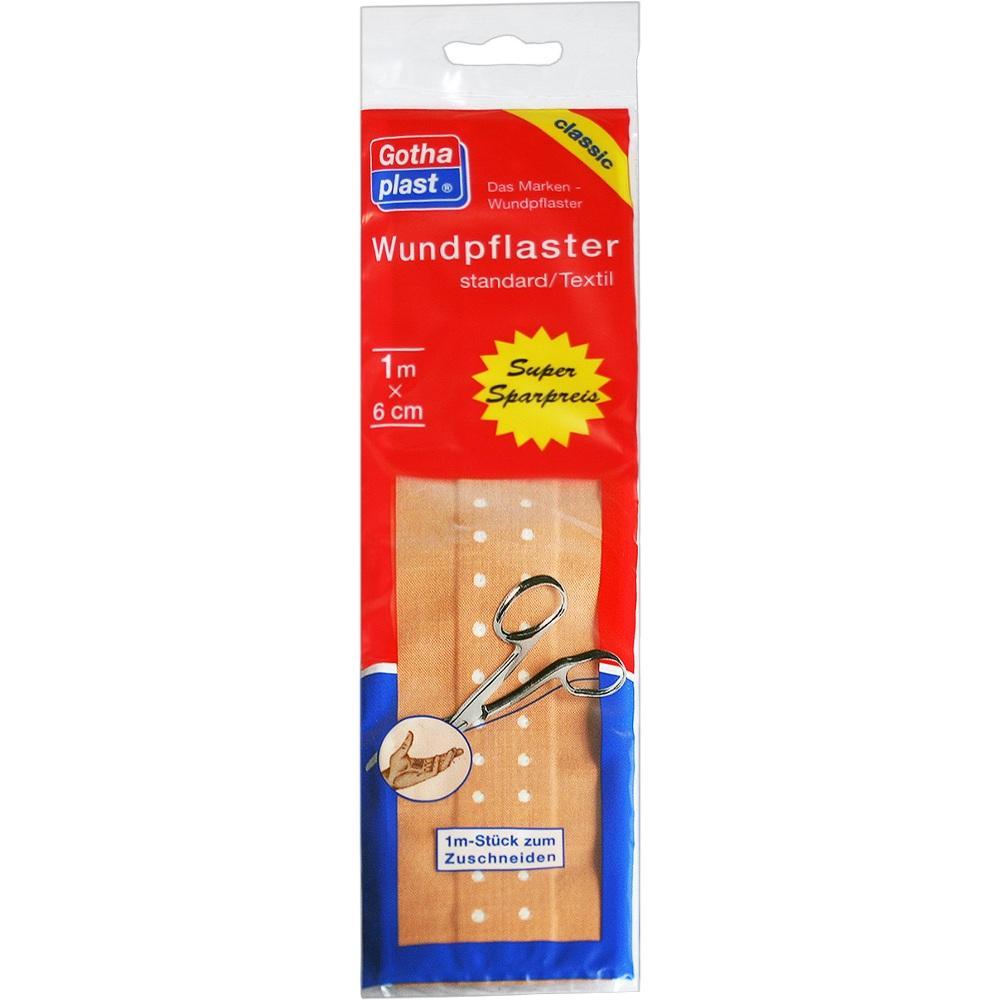 Rote Verpackung mit einem Meter Wundpflaster und einer Schere zum Zuschneiden.