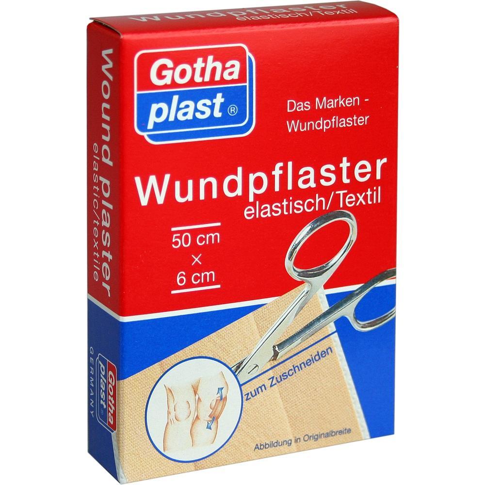 Rote Verpackung eines elastischen Wundpflasters mit einer Schere zum Zuschneiden.