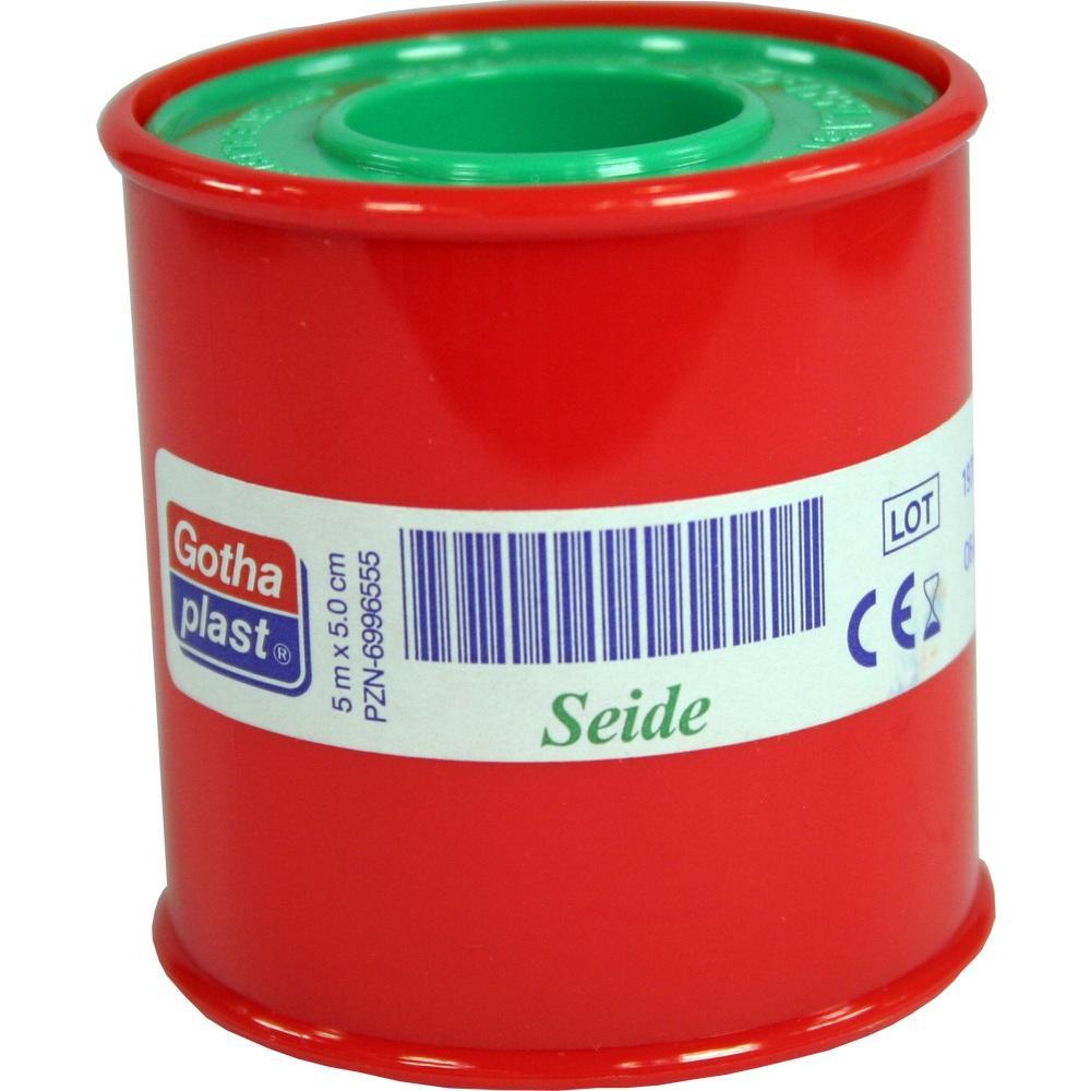 Rote Plastikrolle mit medizinischem Klebeband und Etikett.