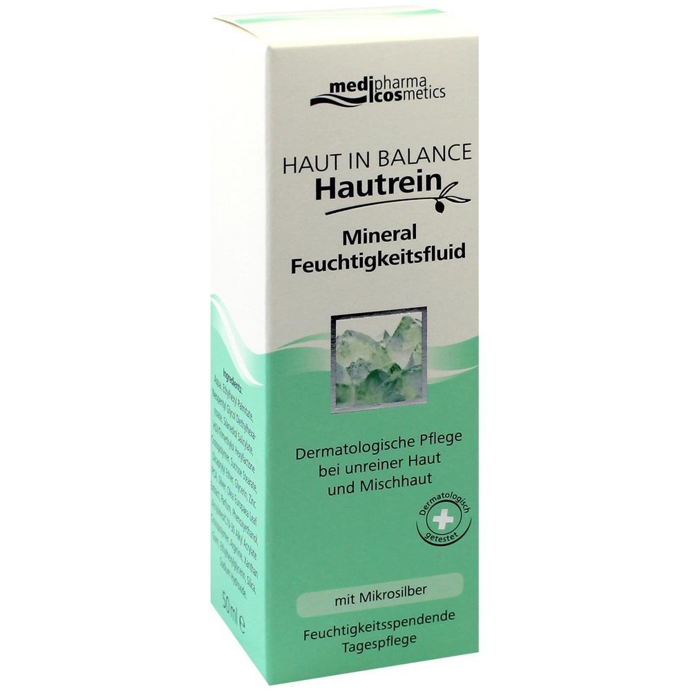 Grüne und weiße Verpackung einer Hautpflegecreme gegen unreine Haut.