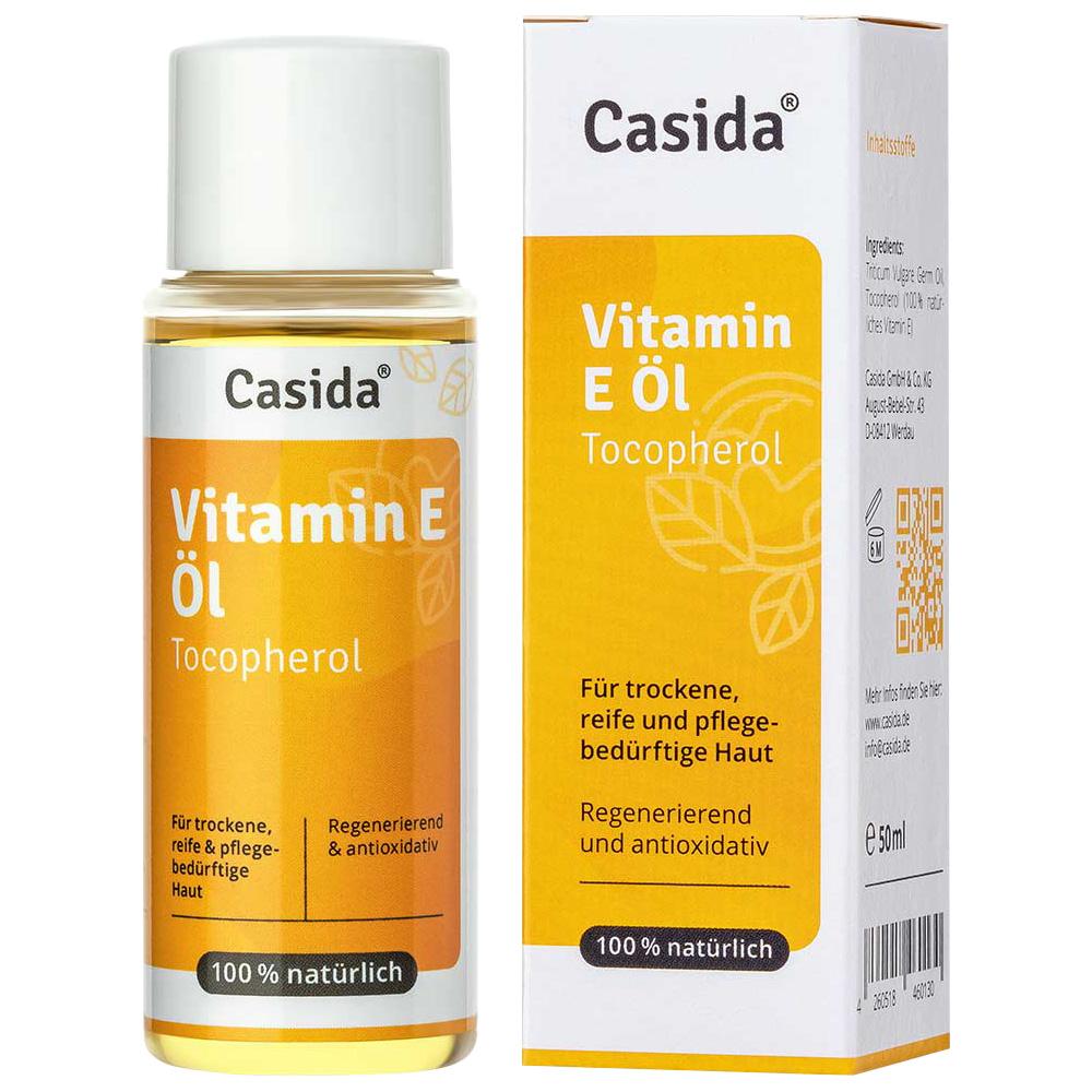 Flasche Vitamin E &Ouml;l von Casida neben der Verpackung, f&uuml;r trockene Haut.