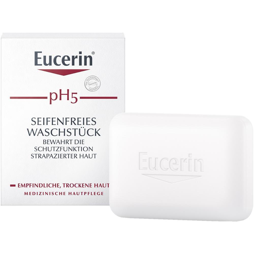 Eine weiße Seife und eine Verpackung mit dem Wort "Eucerin" drauf.