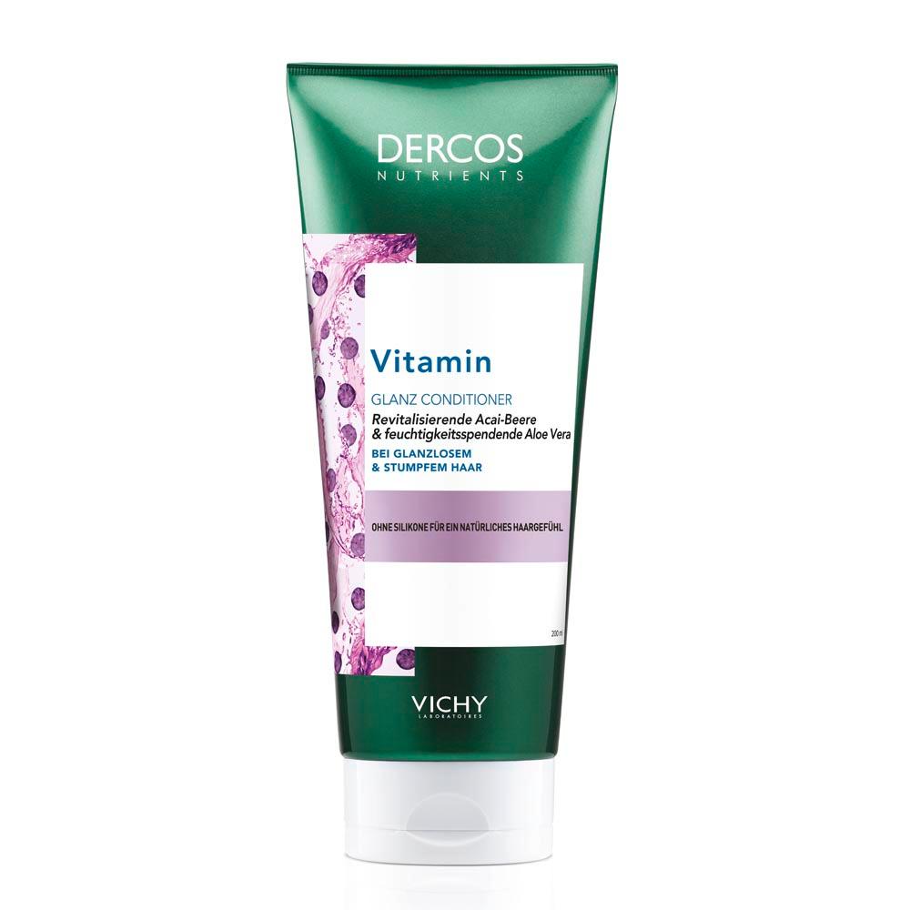 Gr&uuml;ne Flasche eines Haarconditioners mit violettem Etikett und Beschreibung.