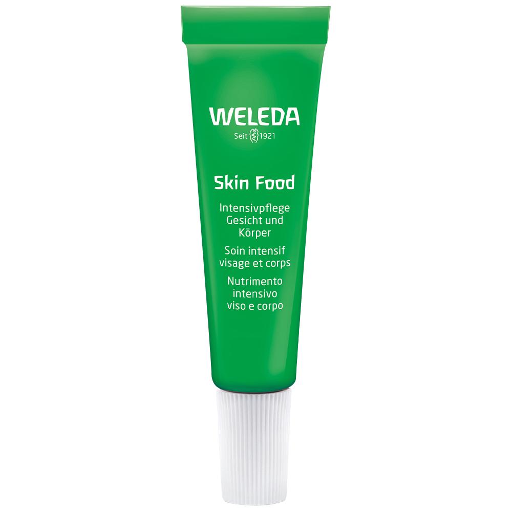 Grüne Tube mit der Aufschrift "Weleda Skin Food" für intensive Hautpflege.