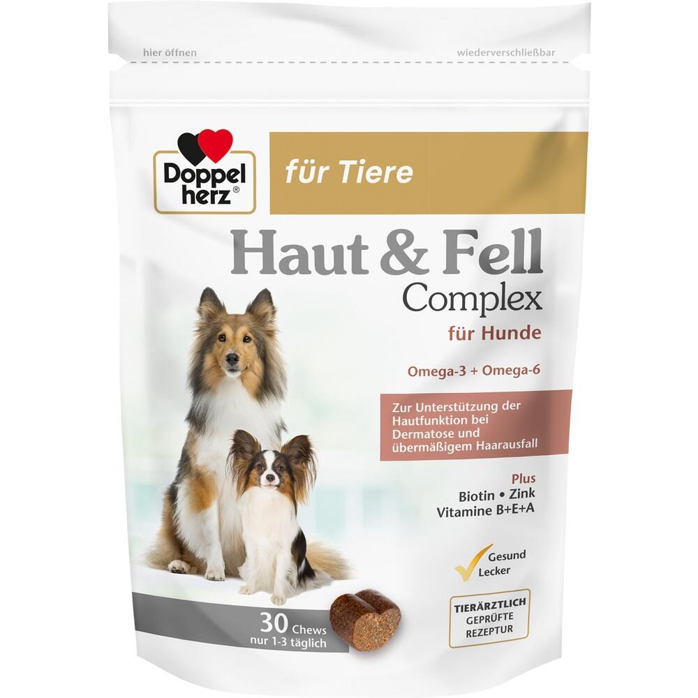 Verpackung mit Nahrungsergänzung für Hunde, zeigt zwei Hunde auf der Vorderseite.