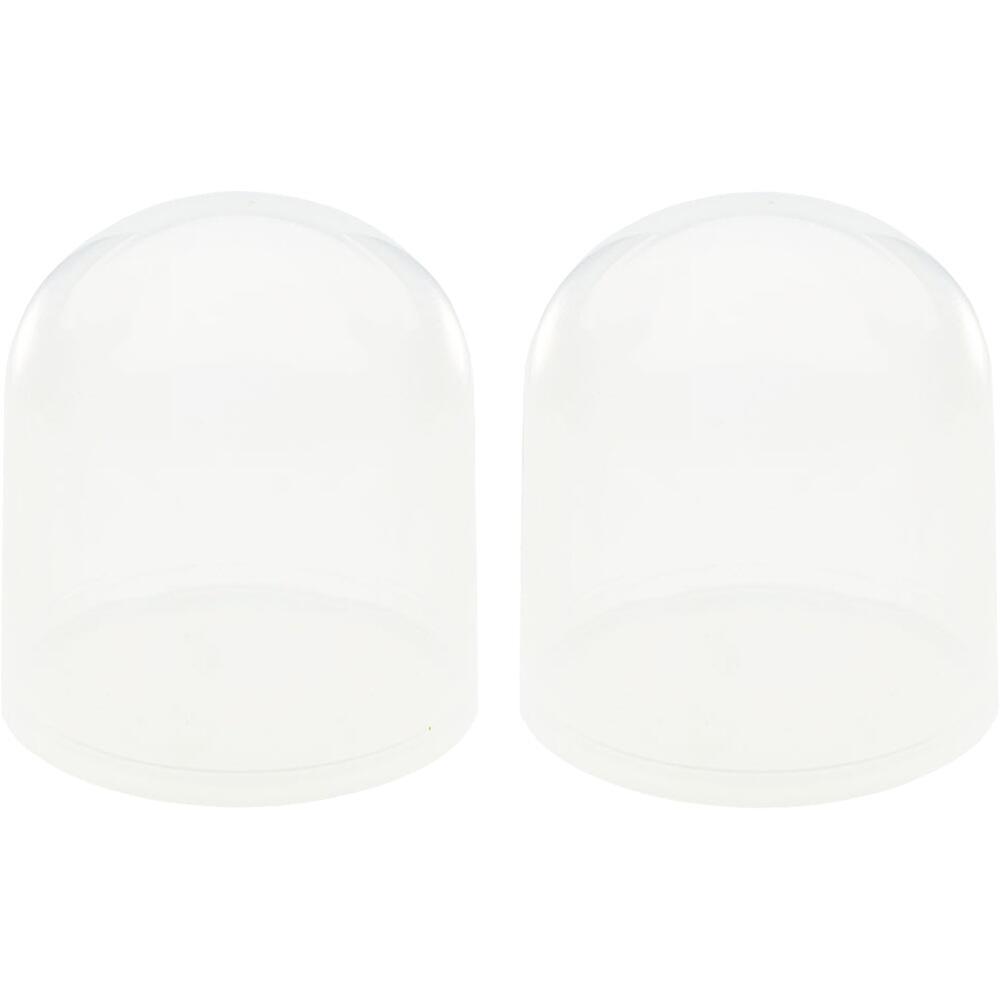 Zwei durchsichtige Plastikkappen stehen nebeneinander.