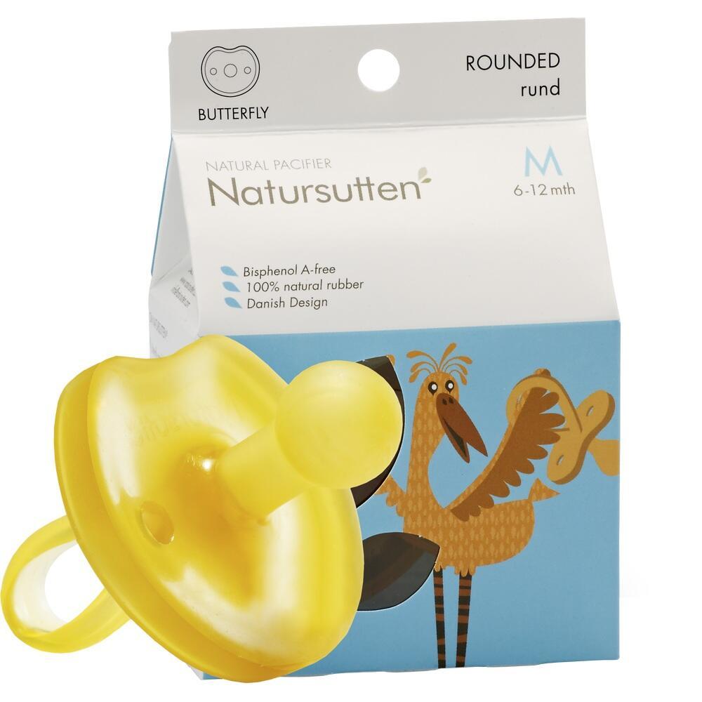 Gelber Schnuller vor einer blauen Verpackung mit Vogelbild.