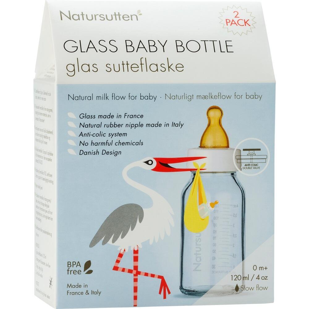 Eine Babyflasche aus Glas mit einem Storch auf der Verpackung.
