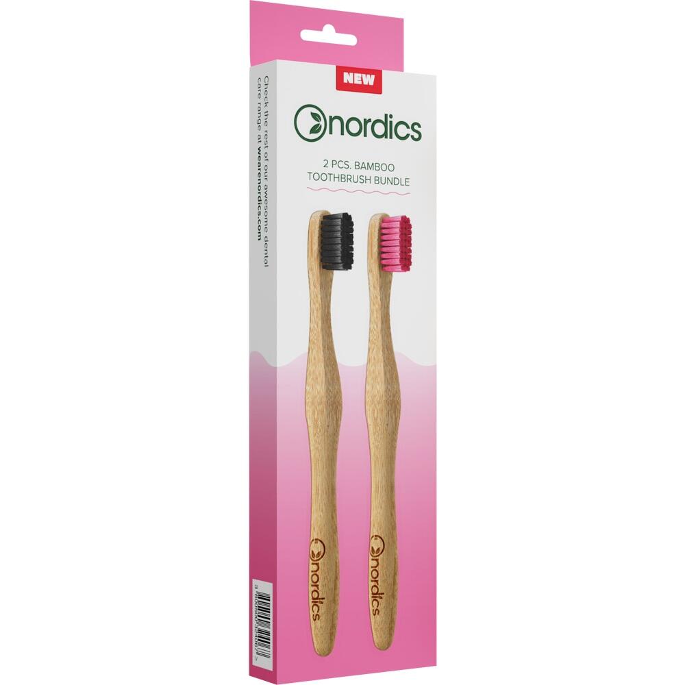 Zwei Bambuszahnb&uuml;rsten mit schwarzen und roten Borsten in einer Verpackung.